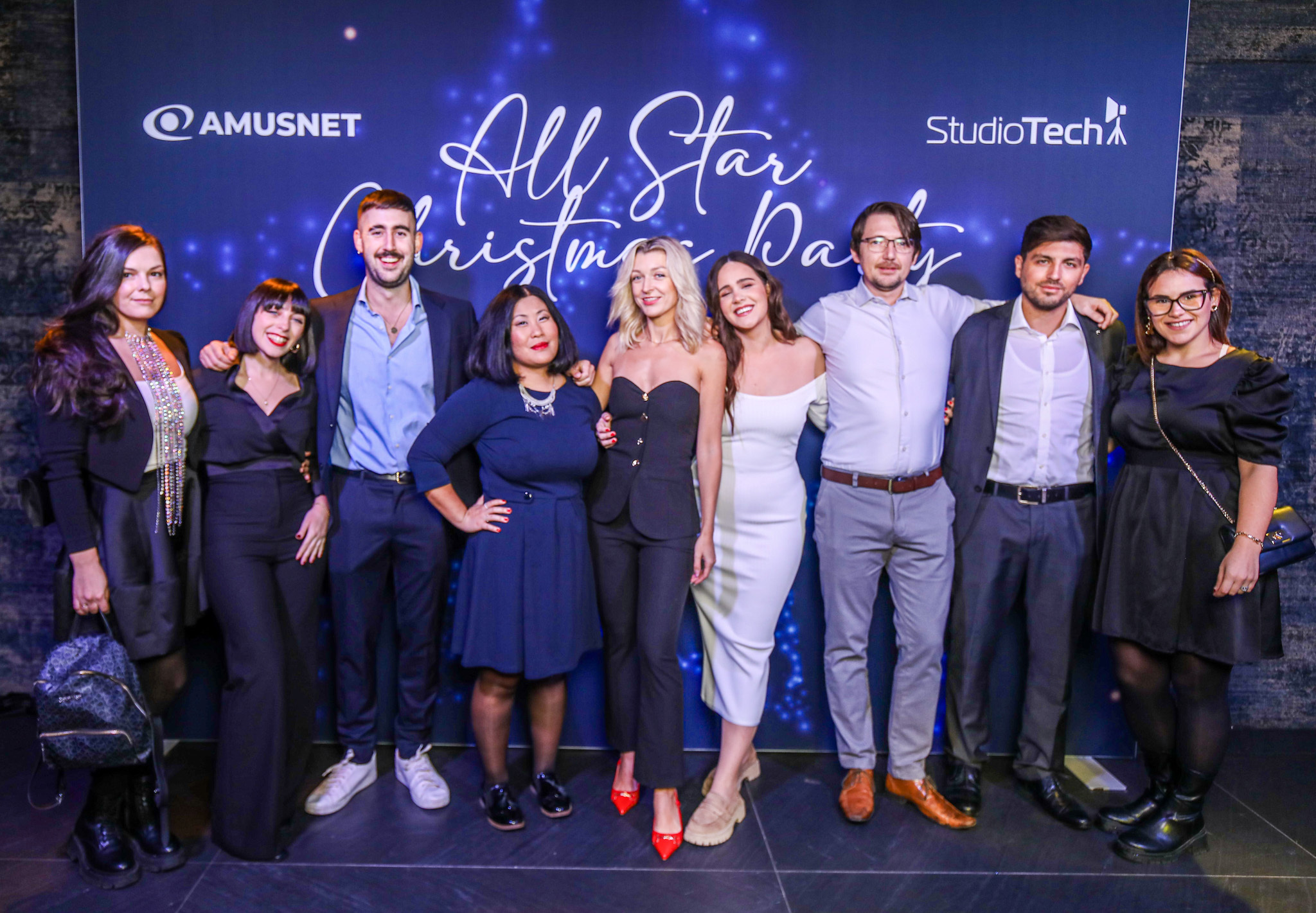 Amusnet celebrating together